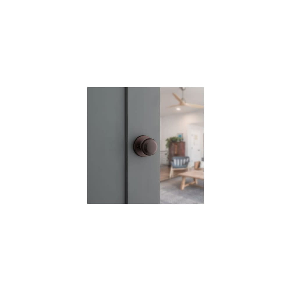 Kwikset Cove Venetian Bronze Steel Passage Door Knob 3 Right or Left Handed