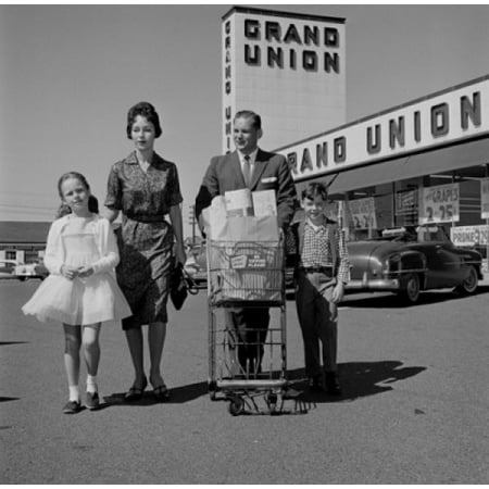 Parents and kids walking across supermarket parking lot with shopping Stretched Canvas -  (24 x 36)