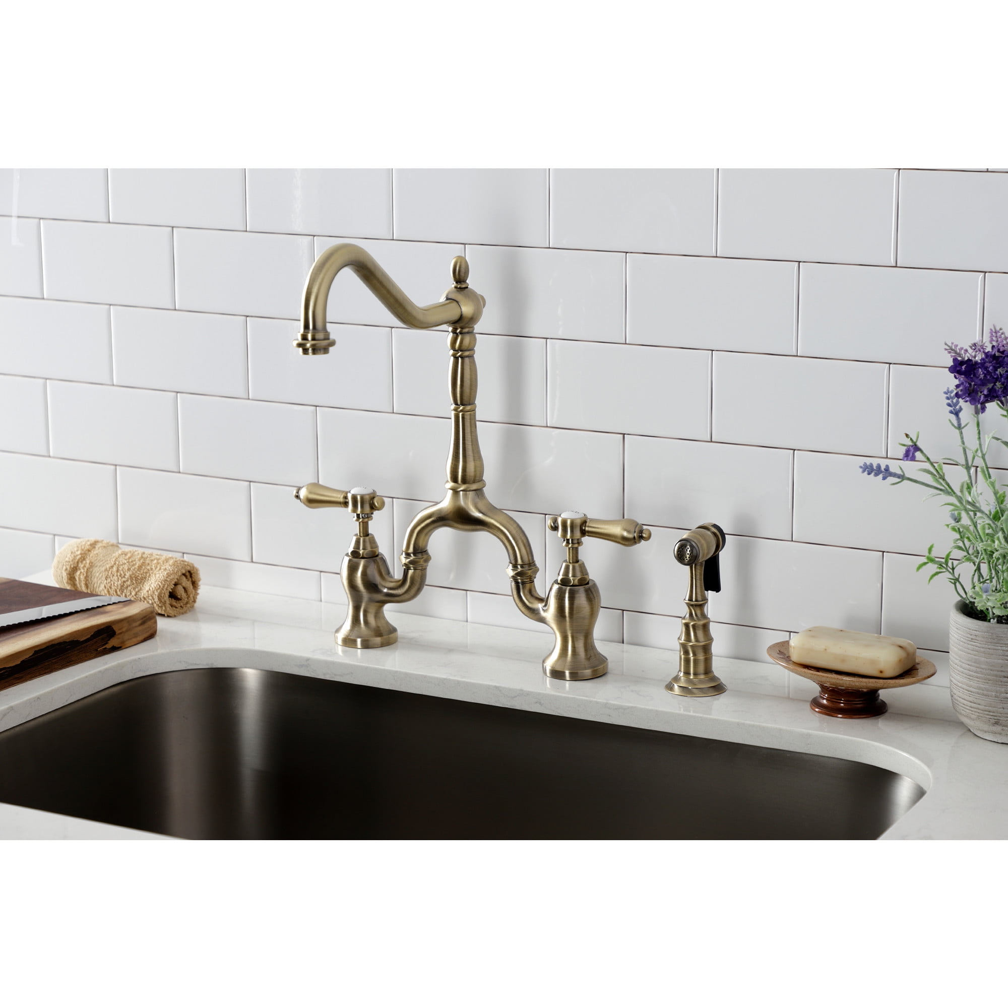 Kingston Brass KS7753BALBS Heirloom Two-Handle 3-Hole Deck Mount Bridge Kitchen Faucet with Brass Side Sprayer in Antique Brass