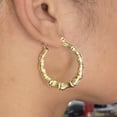 thumbnail image 3 of LoveBling 10k Yellow Gold Bamboo Hoop Earrings (1.40"), 3 of 3