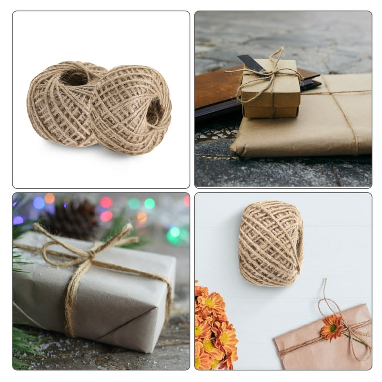 Two coil bobbins of burlap jute twine over white-165903