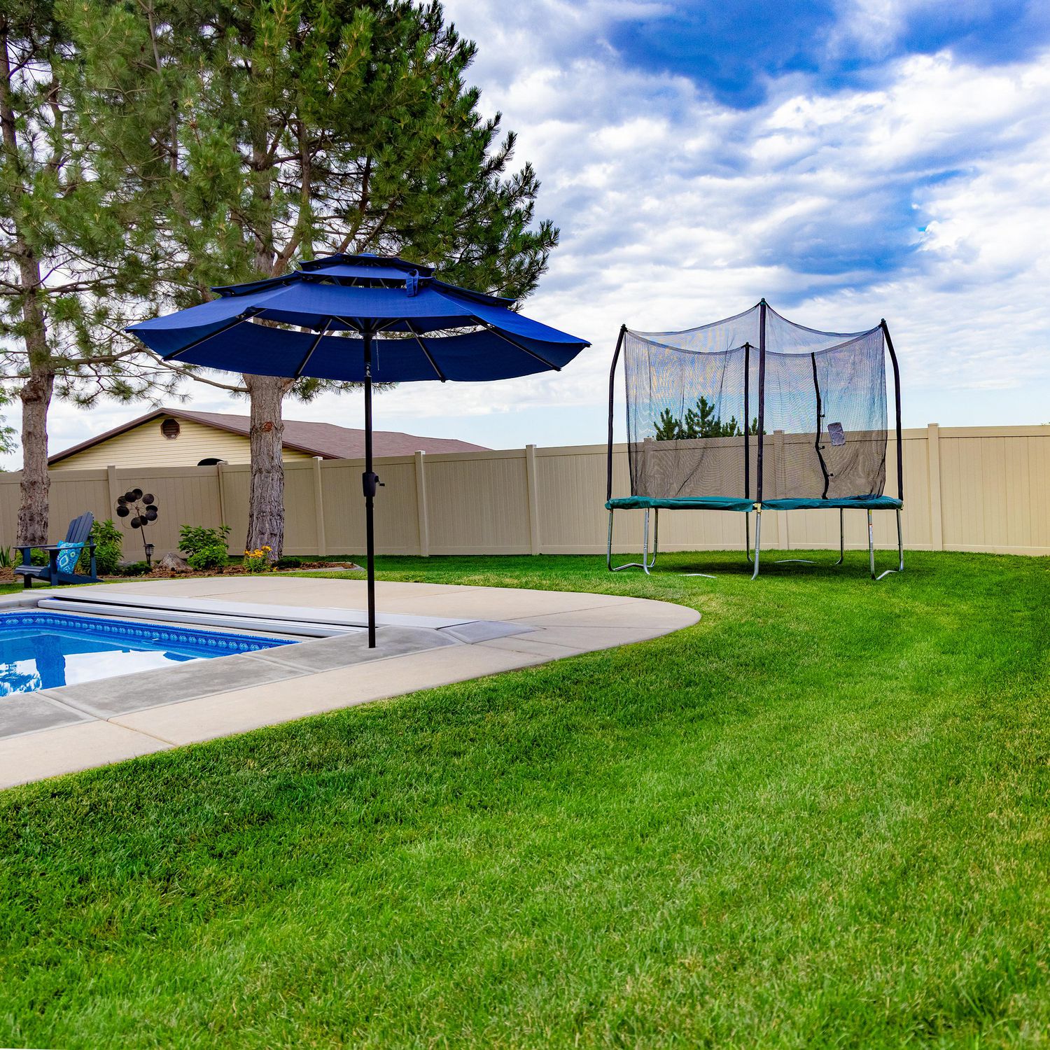 SKYWALKER TRAMPOLINES 10 FT, Round, Green Outdoor Trampoline for Kids with Safety Enclosure Net and Spring Pad, ASTM Approval, Rust Resistant