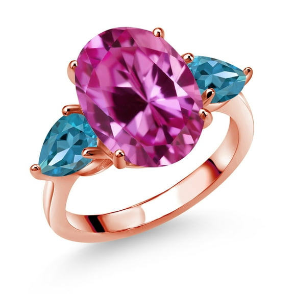 Gem Stone King 18K Rose Gold Plated Silver Pink Created Sapphire and London Blue Topaz Ring for Women (7.54 Cttw, 14X10MM Oval and 7X5MM Pear Shape, Gemstone September Birthstone, Size 8)