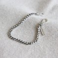 thumbnail image 3 of Knotted, adjustable link bracelet made of silver with a charm, 3 of 5