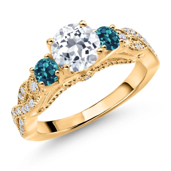 Gem Stone King 18K Yellow Gold Plated Silver White Topaz London Blue Topaz and White Moissanite Engagement Ring for Women (1.43 Cttw, Gemstone November Birthstone, Round 6MM and 3MM, Size 6)