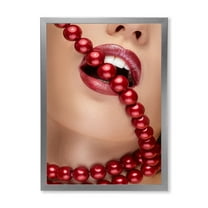 Designart 'Girl Mouth With Red Lipstick Biting Red Pearls' Modern Framed Art Print