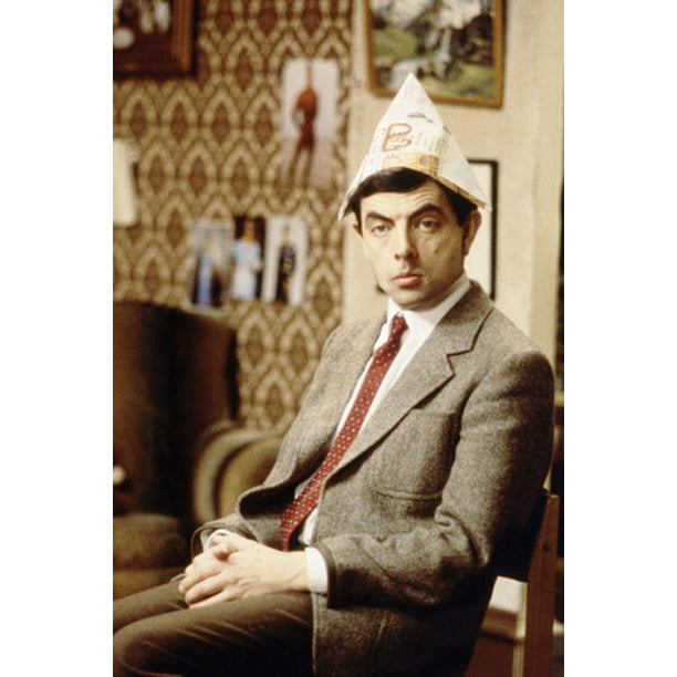 Rowan Atkinson Mr. Bean 24x36 Poster sitting in chair Christmas hat