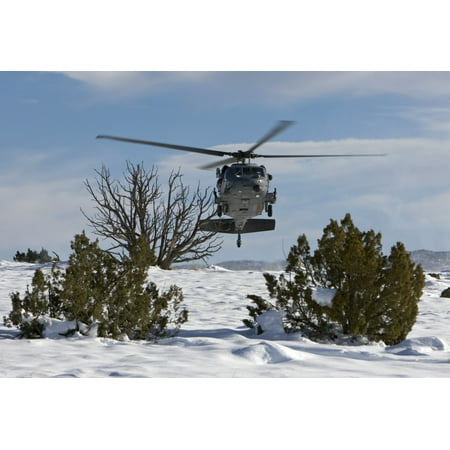 An HH-60G Pave Hawk flys low over a landing zone in New Mexico Canvas Art - HIGH-G ProductionsStocktrek Images (35 x