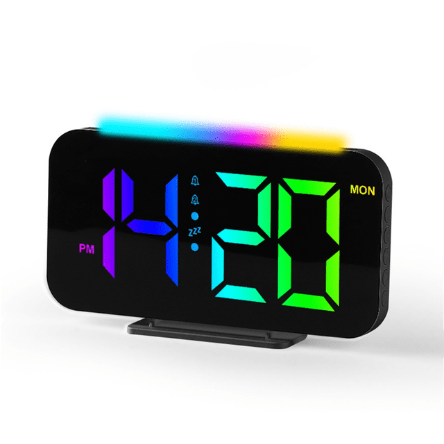 LED Digital Clock RGB Display Alarm Clock with Ambient Lighting Night Lamp Electronic LED Time Display Desktop Clock-B. This modern clock features a single-sided display with vibrant RGB lighting in 8 color modes. It includes dual alarms, adjustable volume, five brightness levels, and a 12/24-hour format. The clock also serves as a night lamp with 10 lighting modes and a sleep function. Constructed from durable ABS material, it is ideal for living rooms, offices, nurseries, and more.
