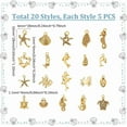 thumbnail image 3 of Juego de 100 colgantes de estilo tibetano con forma de concha, estrella de mar, delfín y peces marinos, surtidos en 20 estilos., 3 of 9