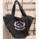 thumbnail image 1 of Bolsos de Disney Stitch de gran capacidad, estilo anime, informales, combinables, para mujer, de moda, para guardar cosas, mochilas de viaje al aire libre., 1 of 5
