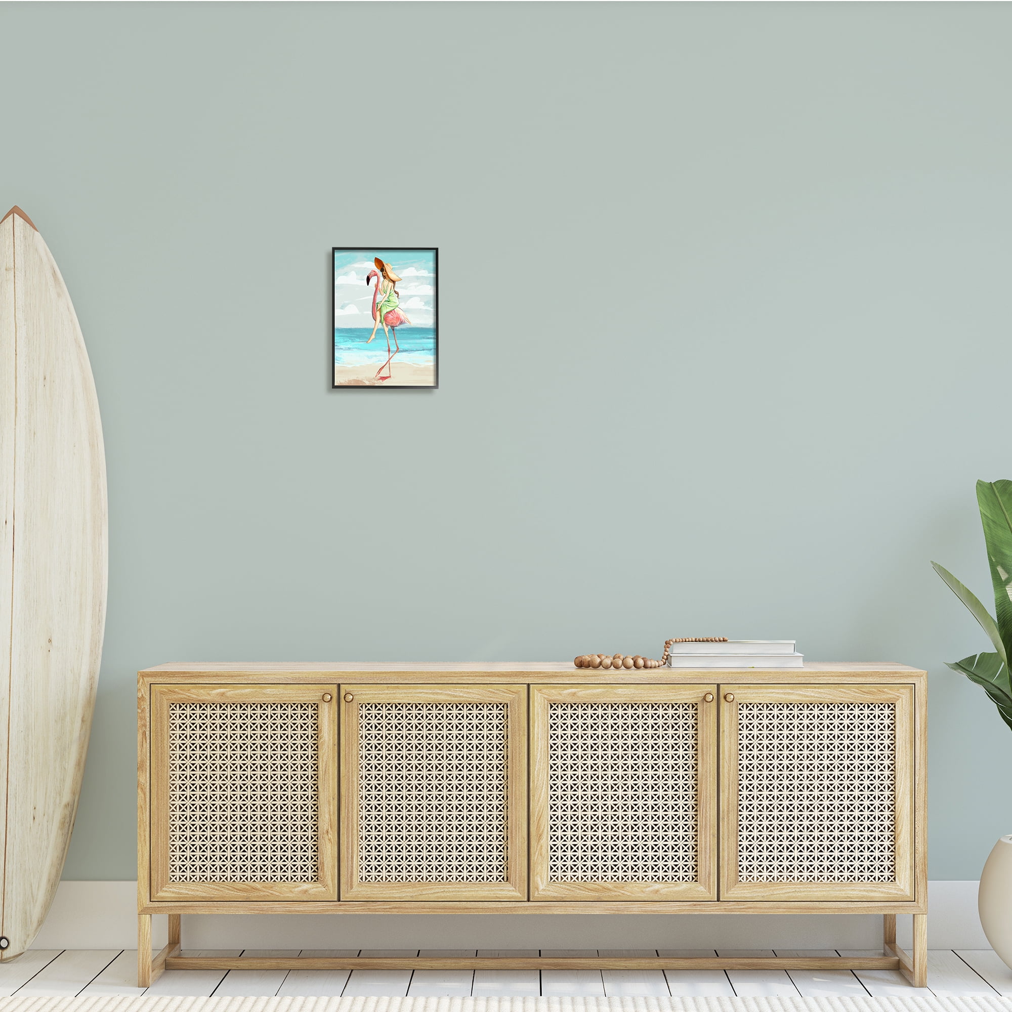 Beach Woman Riding Pink Flamingo Tall Tropical Bird 11 in x 14 in Framed Painting Art Prints, by Stupell Home Décor