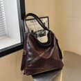 thumbnail image 1 of Bolso de hombro femenino de versión coreana de gran capacidad con textura de viaje retro, bolso de mano femenino versátil de principios de primavera 2025., 1 of 5