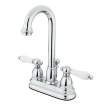 Kingston Brass Restoration Two Handle 4" Centerset Lavatory Faucet with Retail Pop-up