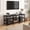 Black-With Power Outlets, variant on Tomnk TV Stand for 55 Inch TVs, Entertainment Center with Charging Station and Lights, Open Storage Shelves with Sound Rack, Media Console for Living Room and Bedroom, Black