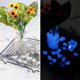 thumbnail image 5 of Guijarros decorativos para jardines, de resina no tóxica, de color blanco diurno y azul nocturno, reutilizables y seguros para uso en interiores y exteriores (aproximadamente 100 piezas), 5 of 7
