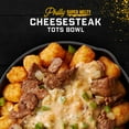 thumbnail image 6 of Guy Fieri's Flavortown Philly Super Melty Cheesesteak Tots Bowl with Shaved Steak and Cheese Sauce, 9.5 oz (Frozen), 6 of 6