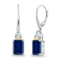 Gem Stone King 5.86 Cttw Blue Created Sapphire and White Moissanite Dangle Earrings for Women | 925 Sterling Silver and 10K Yellow Gold | Emerald Cut 9X7MM | Trillion 4MM