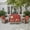 Coarse Orange Red, variant on Ovios 5 Pieces Outdoor Furniture Set High Back All-Weather Wicker Patio Conversation Set with Ottomans, Orange Red(Textured)