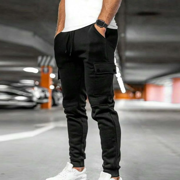 Pantalones largos de moda para hombre, casuales, de color sólido, con bolsillos y cremallera, cintura elástica, de poliéster.