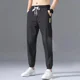 thumbnail image 3 of Pantalones de hombre recortados de seda fina de hielo, pantalones casuales para hombre, ropa de tendencia fresca de verano, ropa original de alta calidad, holgada, 3 of 5