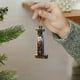thumbnail image 1 of Adornos de árbol de Navidad de 26 letras - Decoraciones acrílicas personalizadas con gorros de Papá Noel, de una pieza, 1 of 7