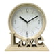 thumbnail image 1 of Reloj de mesa geométrico decorativo con números arábigos, silencioso y redondo. Rosa, 1 of 9