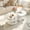 White, variant on 3 Pieces Coffee Table Set, 0.39" Tempered Glass Top and S Shape Base, Oval Modern Coffee Table with 2 Leather Stools, Accent Coffee Table for Living Room Bedroom
