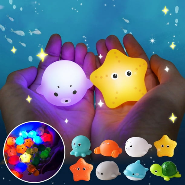 Juego de juguetes de baño Ocean Animal Light Up | Vinilo de caucho flotante Juguetes marinos chirriantes | Juego de piscina acuática sensorial Soft Glow | Red de pesca incluida | 4 Figuras de Peces
