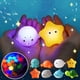 thumbnail image 1 of Juego de juguetes de baño Ocean Animal Light Up | Vinilo de caucho flotante Juguetes marinos chirriantes | Juego de piscina acuática sensorial Soft Glow | Red de pesca incluida | 4 Figuras de Peces, 1 of 7