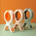 thumbnail image 1 of Paquete de 5 pinzas grandes para secar colchas, para sujetar sábanas, pinzas para toallas de playa, pinzas de plástico resistentes al viento para sillas de playa, 1 of 10