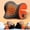 Orange, variant on Famedio Heated Neck Stretcher Cervical Traction Device, Graphene Heating Pad Chiropractic Pillow for Neck & Shoulder Pain Relief