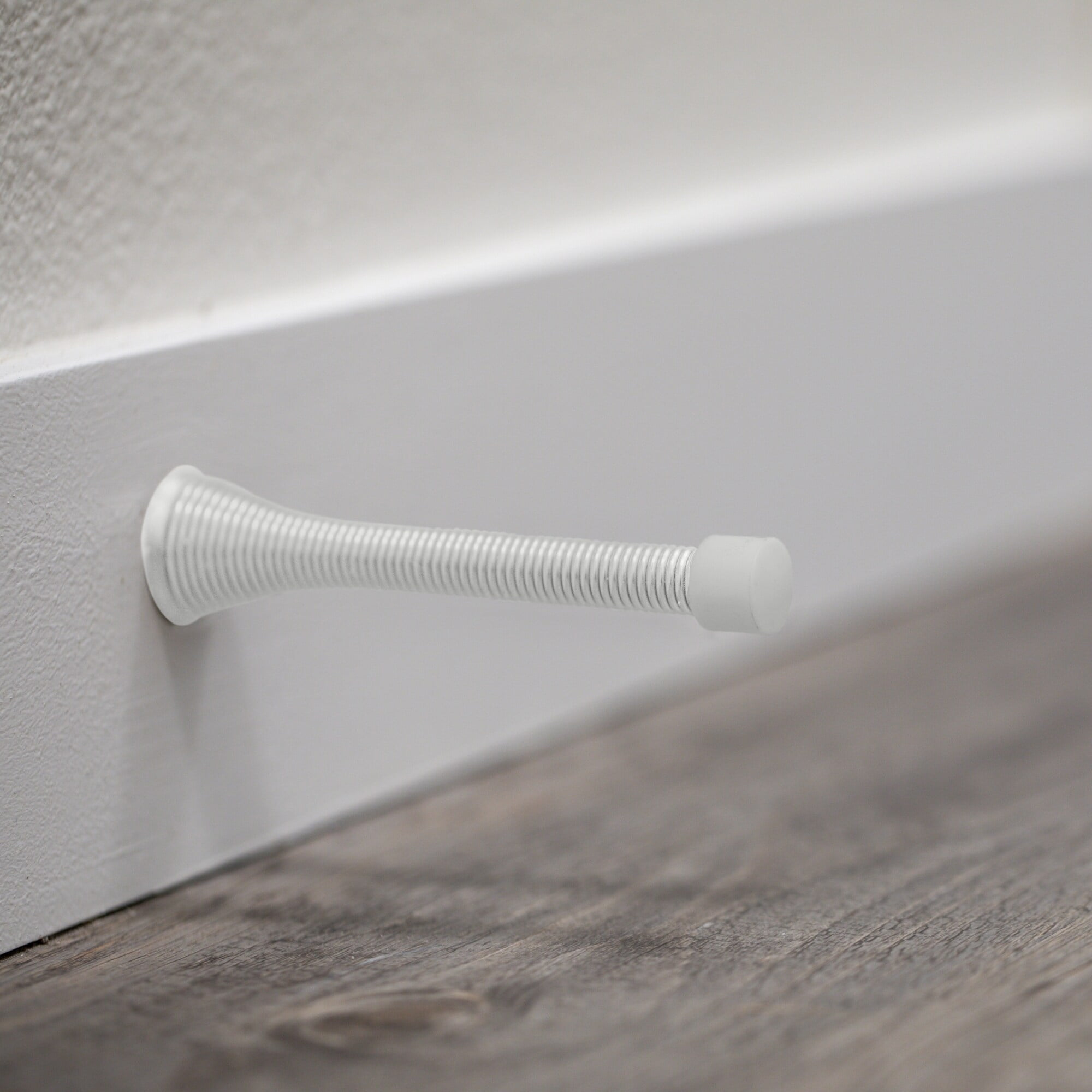 Design House 10-Pack Spring Door Stop Wall Protector with Rubber Tip, Matte Black