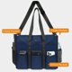thumbnail image 4 of Bolsa TopDesign Utility resistente al agua con 22 bolsillos, color azul, 4 of 7