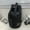 Black, variant on Versatile Large Capacity Canvas Travel Backpack for Men Women Perfect for Shopping Trips and Outdoor Activities