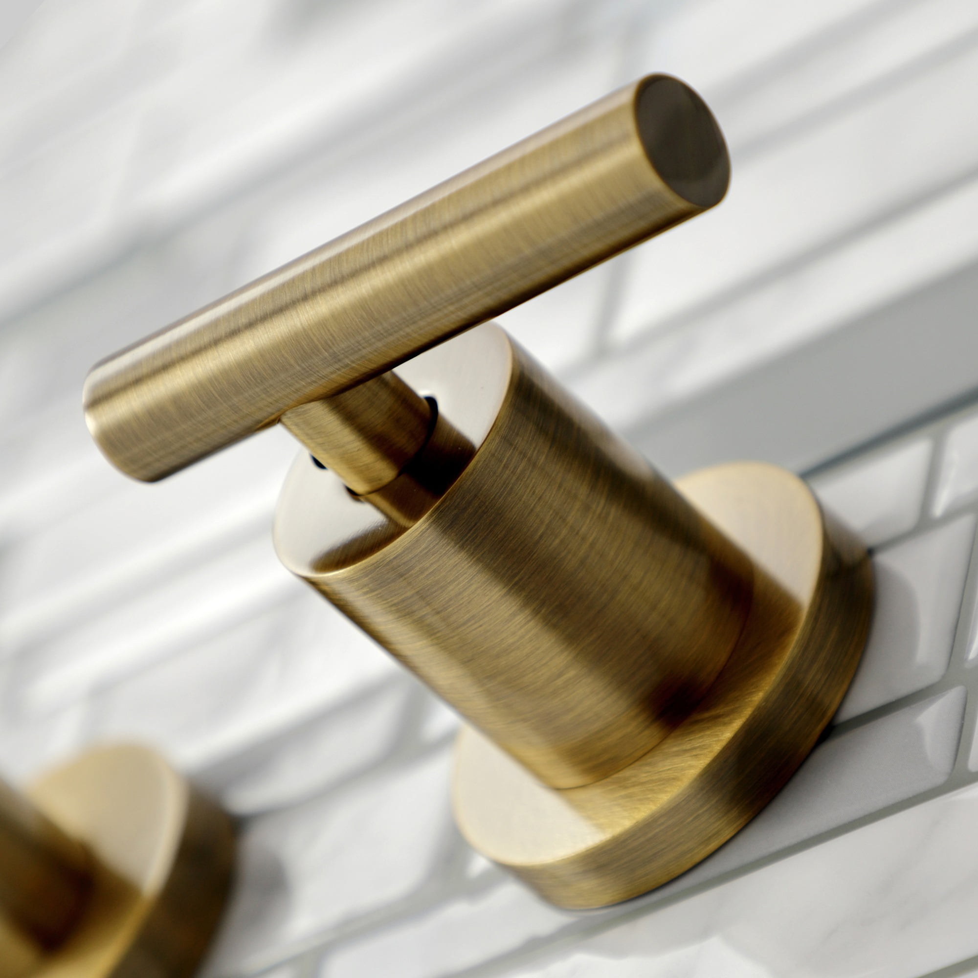 Kingston Brass KS8023CML Manhattan Two-Handle Wall Mount Roman Tub Faucet, Antique Brass