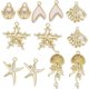thumbnail image 1 of 1 caja con 24 dijes de animales marinos en 6 estilos diferentes: estrella de mar, diamantes de imitación, aleación dorada, perlas, conchas marinas, medusas y conchas de estrella., 1 of 5