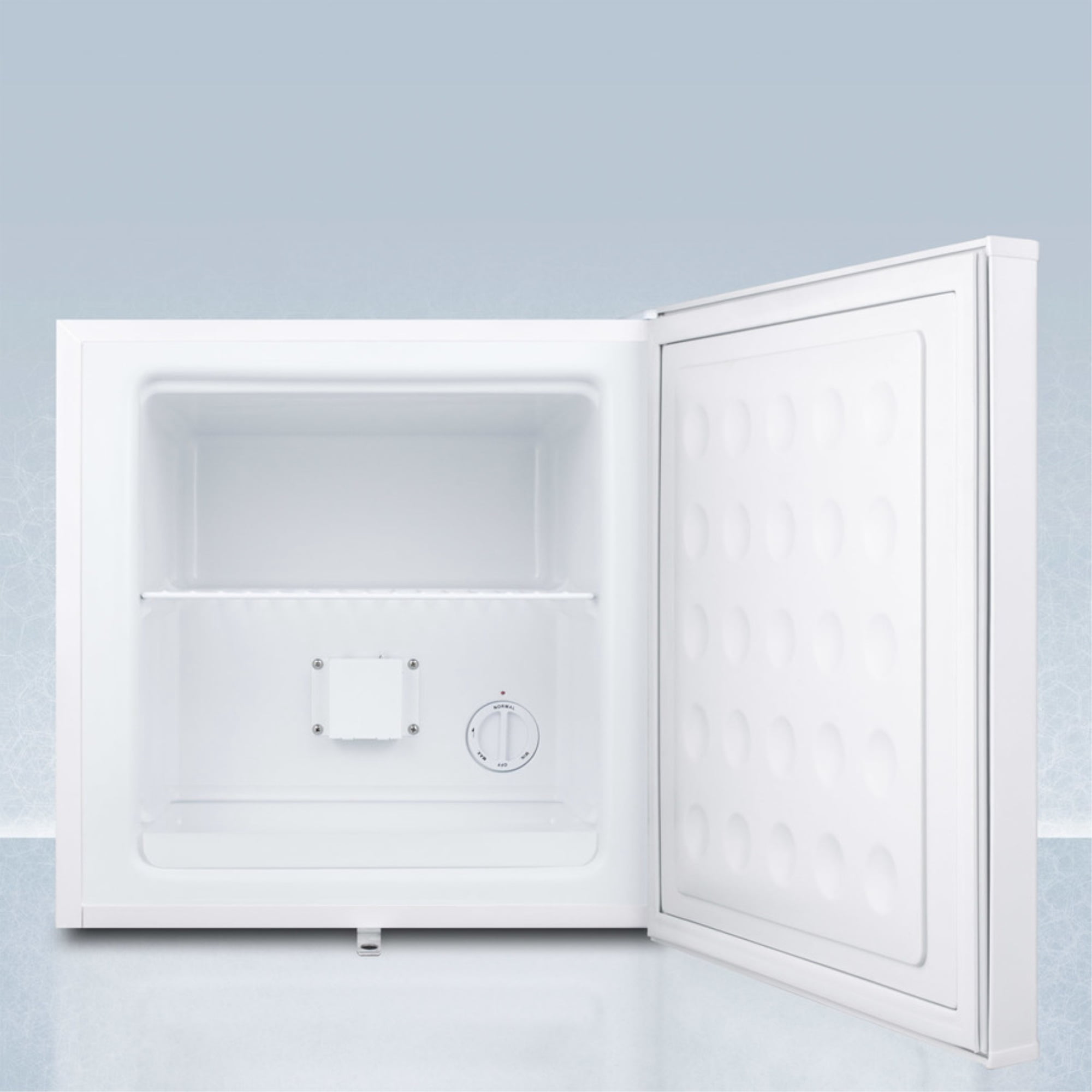 Compact manual defrost all-freezer with lock and probe hole