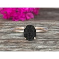 thumbnail image 3 of 1.25 Carat Classic Oval Black Diamond Moissanite And Moissanite Diamond Solitaire Engagement Ring on 10k Yellow Gold, 3 of 6
