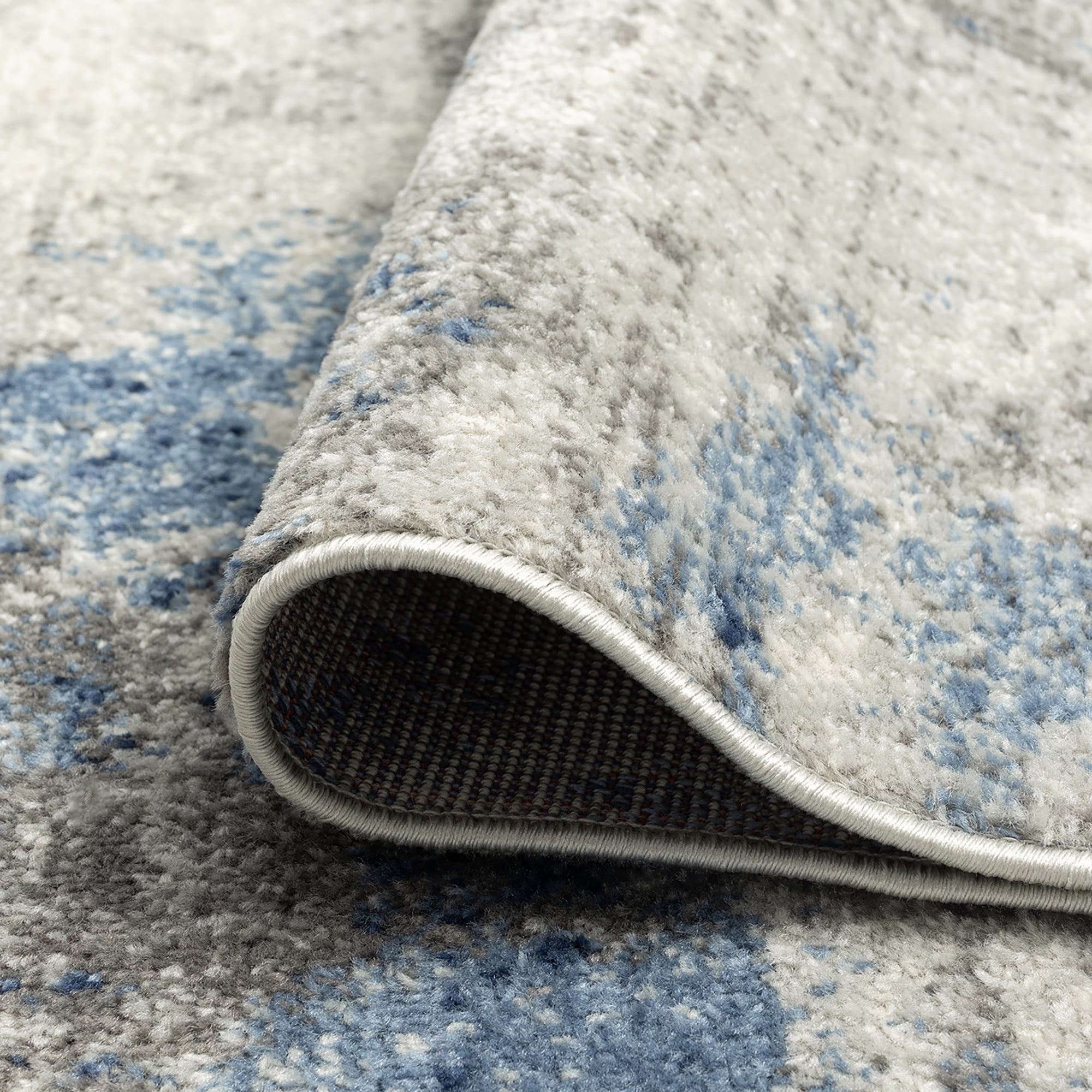 Chelsea Contemporary Abstract 5'3'' x 7'3'' Navy and Blue Polypropylene Indoor Area Rug, 5' x 7'
