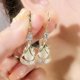 thumbnail image 3 of Pendientes de gota de agua geométricos de circonita púrpura de alta calidad, pendientes de lujo ligeros de nicho para adelgazar el rostro, 3 of 5