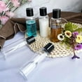 thumbnail image 4 of One storage bag and four 3.4 ounce toiletries travel bottles TSA approved leak proof plastic empty travel bottles with labels, 4 of 7
