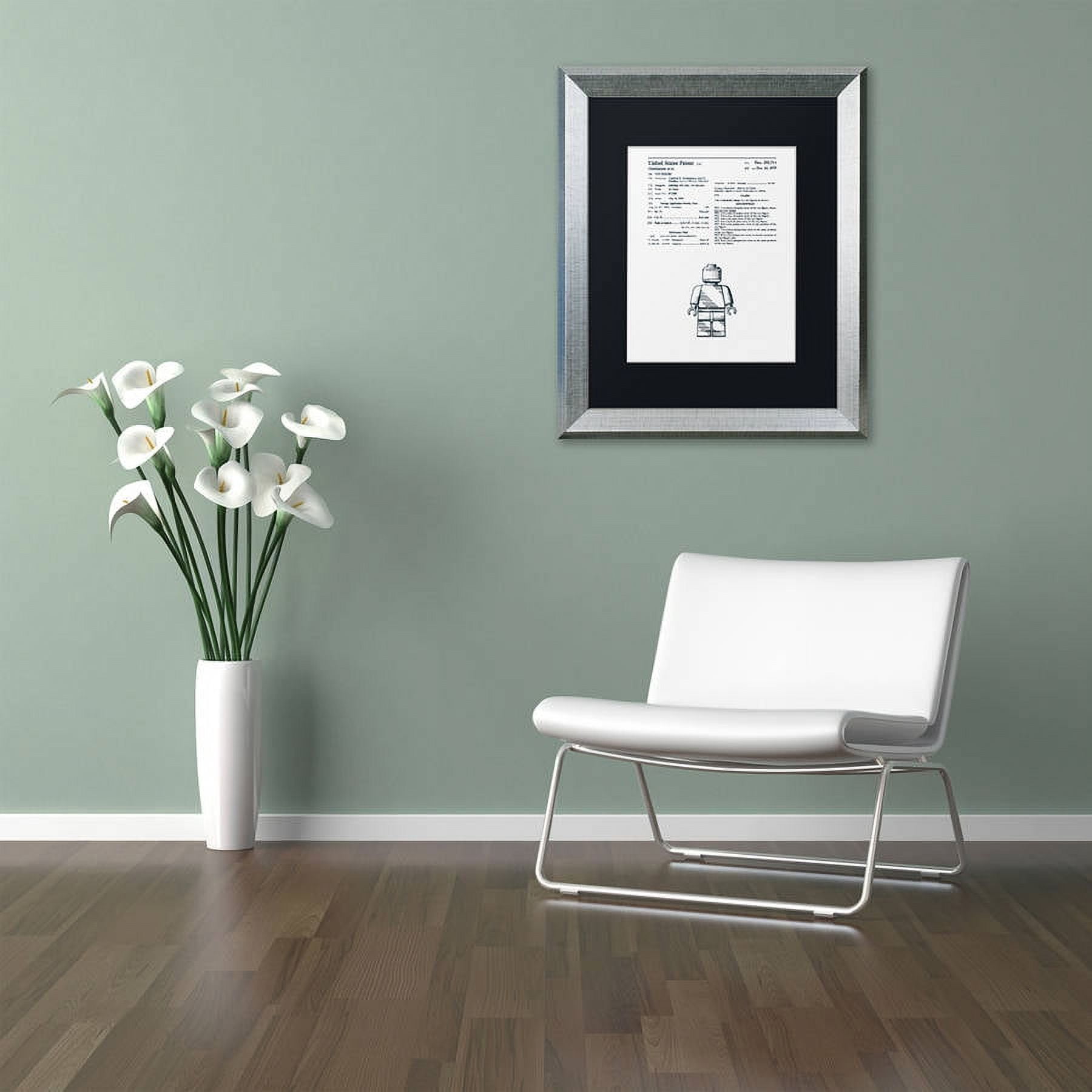 Trademark Fine Art "Lego Man Patent 1979 White" Canvas Art by Claire Doherty, Black Matte, Silver Frame
