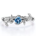 thumbnail image 1 of JeenMata Anillo de Compromiso Solitario con Diseño de Hojas y Topacio Azul Claro Redondo de 0,50 Quilates Chapado en Oro Blanco de 18 K sobre Plata, 1 of 6