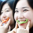 thumbnail image 5 of Entrenador de labios para mujer, herramienta de estiramiento de músculos bucales, ejercitador bucal Facial, Corrector de ejercicio de sonrisa verde y naranja, 2 uds., 5 of 5