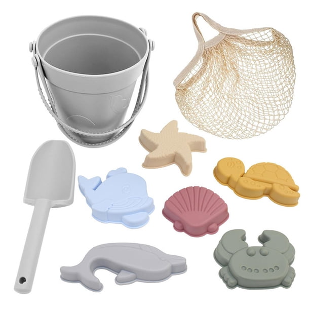 Set de playa de viaje con juguetes de arena y 6 moldes de arena para niños y niñas durante las vacaciones. Gris