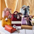 thumbnail image 3 of 12 Pack 6 Colors Small Party Favor Boxes Reusable PU Leather Gift Candy Wrapping Bags with Handle Ribbon Mini Handbags for Weddings Party Guest Gift Bridal Showers Birthday Mixed Color, 3 of 9