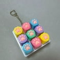 thumbnail image 1 of Botón de silicona con forma de pata de gato para aliviar el estrés: llavero táctil para la oficina y los viajes., 1 of 2