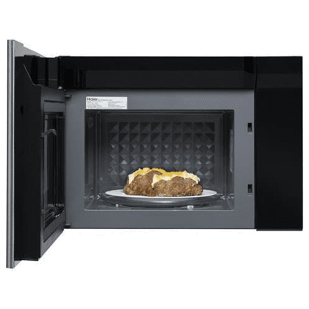 Haier HMV1472BHS 24 Over-the-Range Microwave with 1.4 cu. ft. Capacity 300 CFM Sensor Cooking Hidden Vent 10 Power Levels and 13.6 Turntable in Stainless