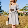 thumbnail image 4 of Una linda vaca con aspecto divertido en un paisaje natural asombroso de las Azores. Vestido morado de manga corta., 4 of 7
